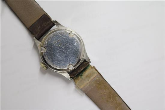 A mid 20th century stainless steel Longines mid size? manual wind wrist watch retailed by J.W. Benson,